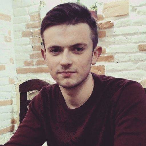 Максим Гузлій